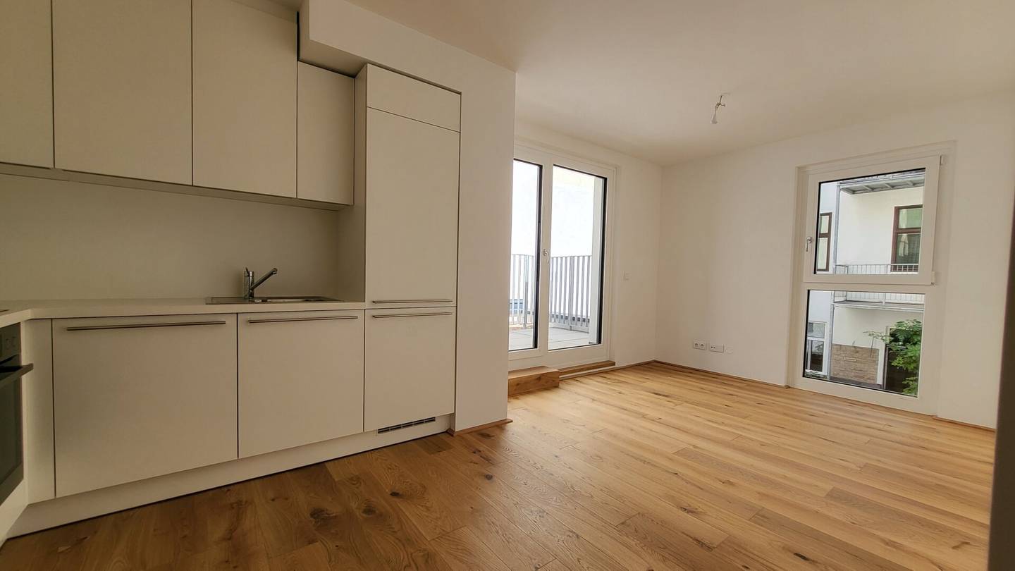 Smarte 2-Zimmer-Wohnung mit Hofterrasse: Hochwertige Ausstattung + Ausgezeichnetes Raumkonzept