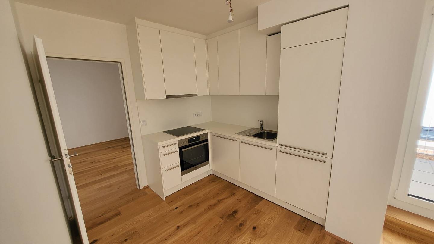 Smarte 2-Zimmer-Wohnung mit Hofterrasse: Hochwertige Ausstattung + Ausgezeichnetes Raumkonzept