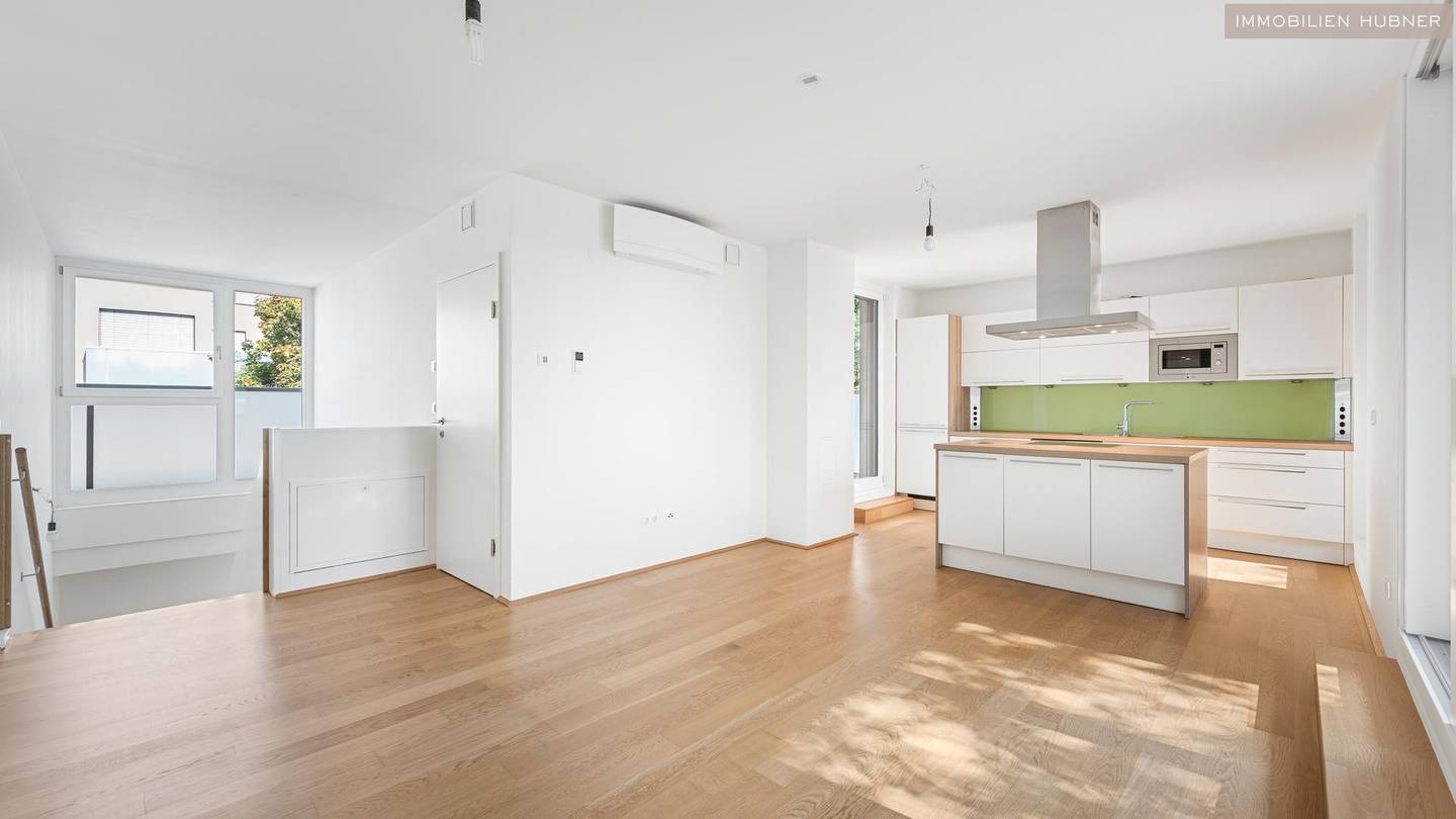 Penthouse mit zwei Dachterrassen und großzügigem Gemeinschaftgarten