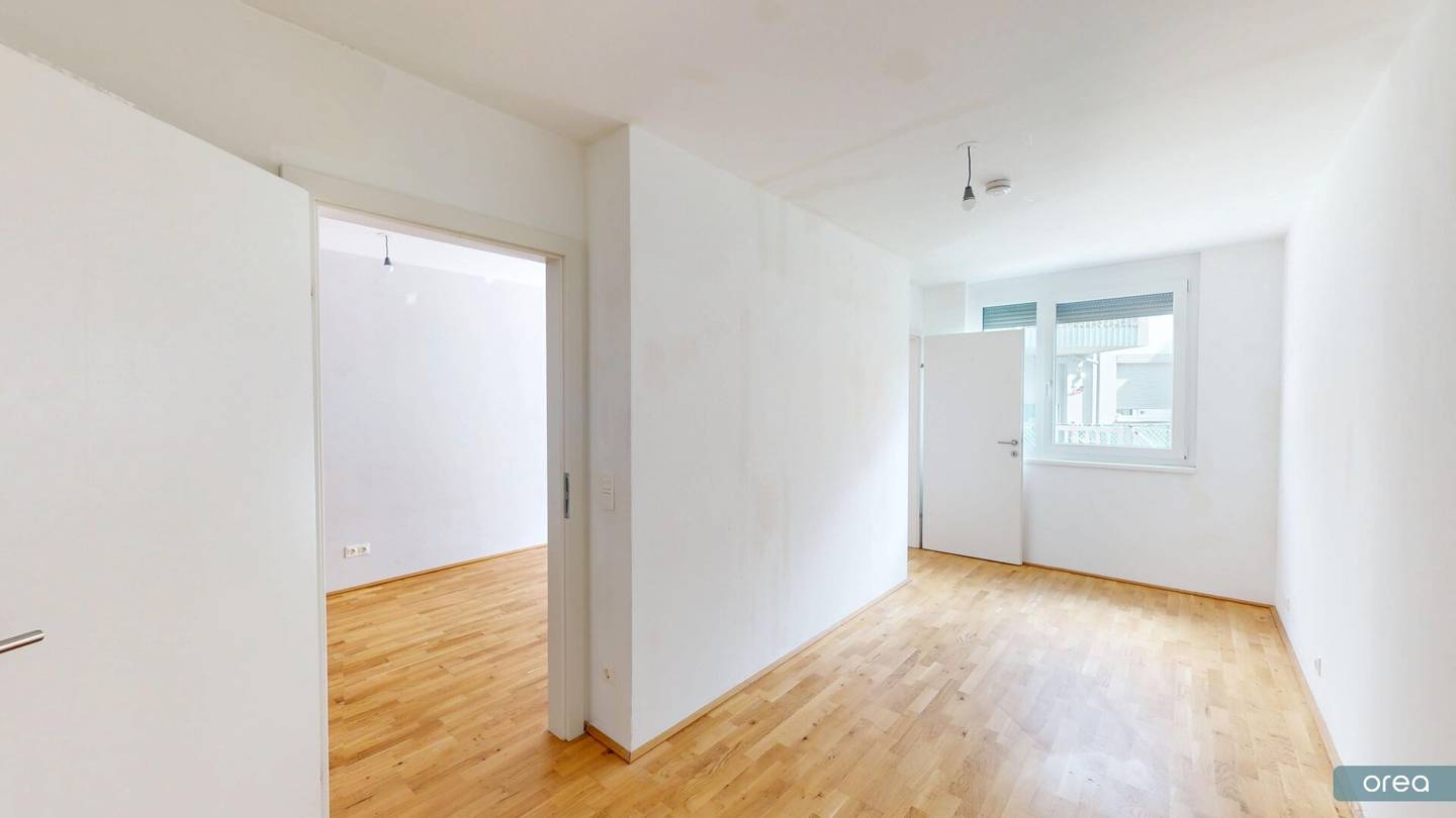 orea | Quiet 2-room garden apartment with terrace in the 22nd district | Smart viewing · Rent online
