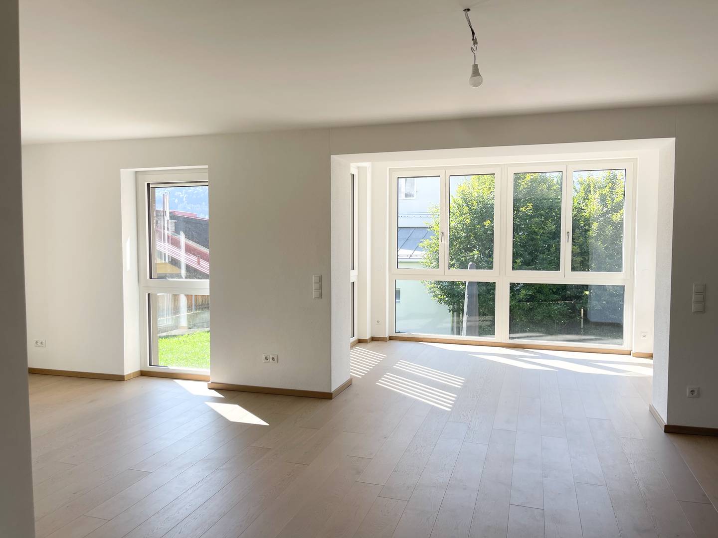 Wohnung mit Privatgarten und Bergblick in ruhiger Lage