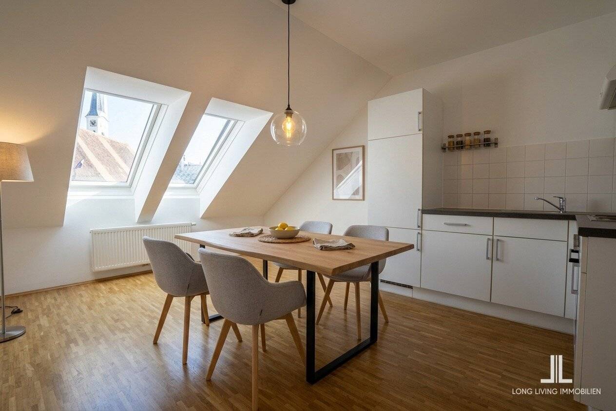 Stylish urban living in the attic, well-maintained 2-room apartment with private lift access Top 13