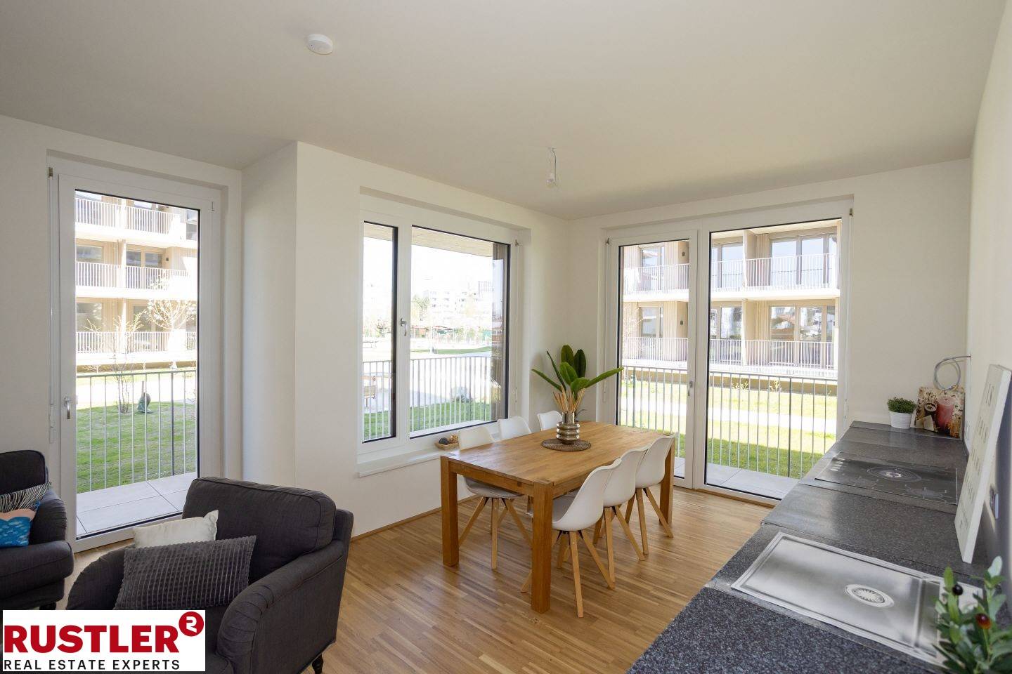 Erdgeschosswohnung mit großzügigem Balkon in grünem Quartier