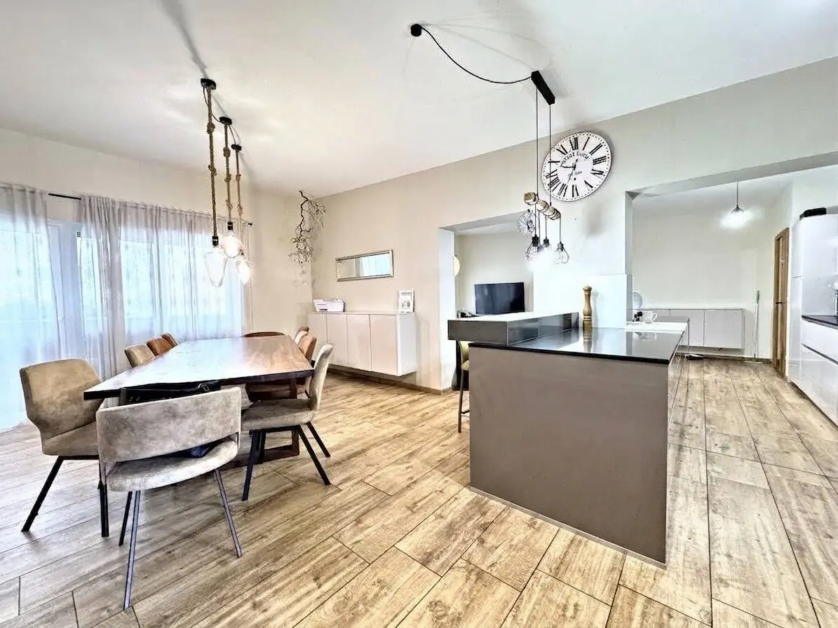 Modern bungalow with 2 residential units, outdoor kitchen & 4 carports