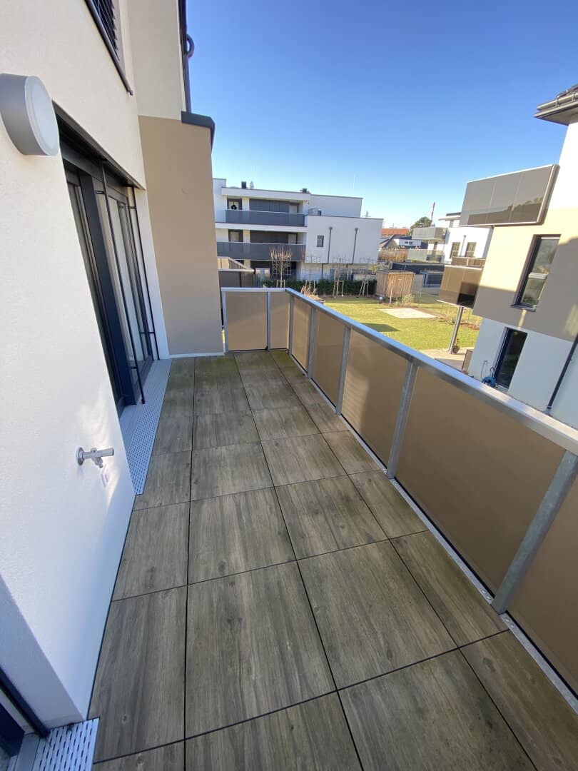 High-quality 2-room apartment with balcony and 2 garage spaces - first occupancy