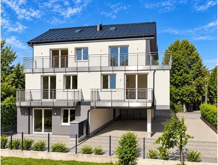 Attractive residential building with commercial space Residential and office building with 3 apartments and 1 office unit