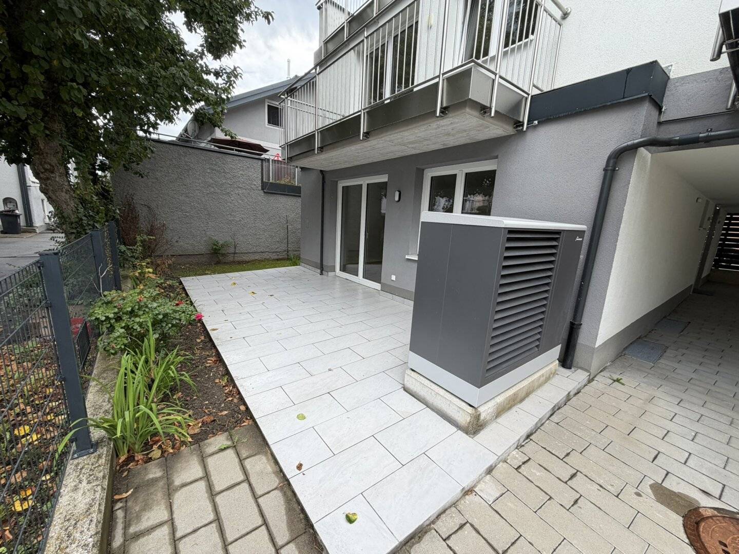 Attractive residential building with commercial space Residential and office building with 3 apartments and 1 office unit