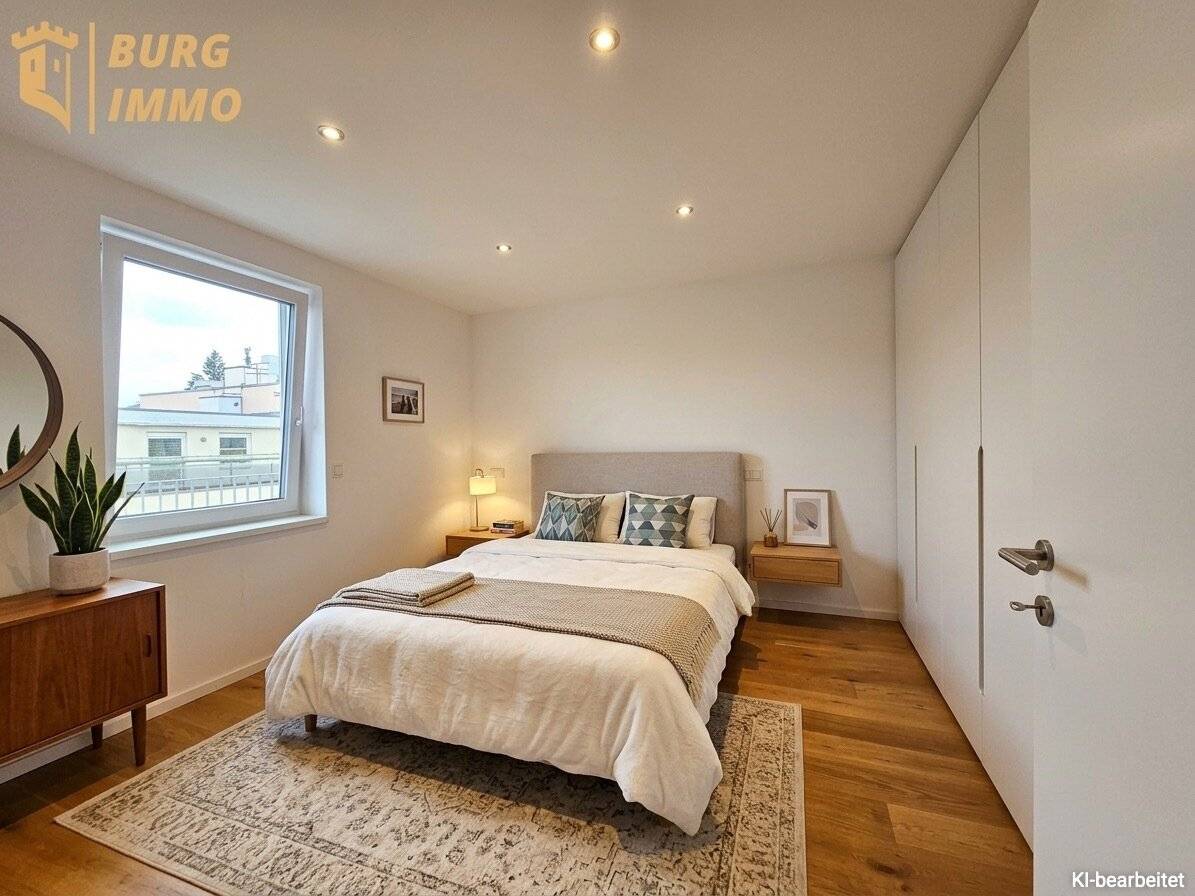 Klimatisierte 2-Zimmer-Dachgeschosswohnung mit großzügiger 33 m² Eckterrasse