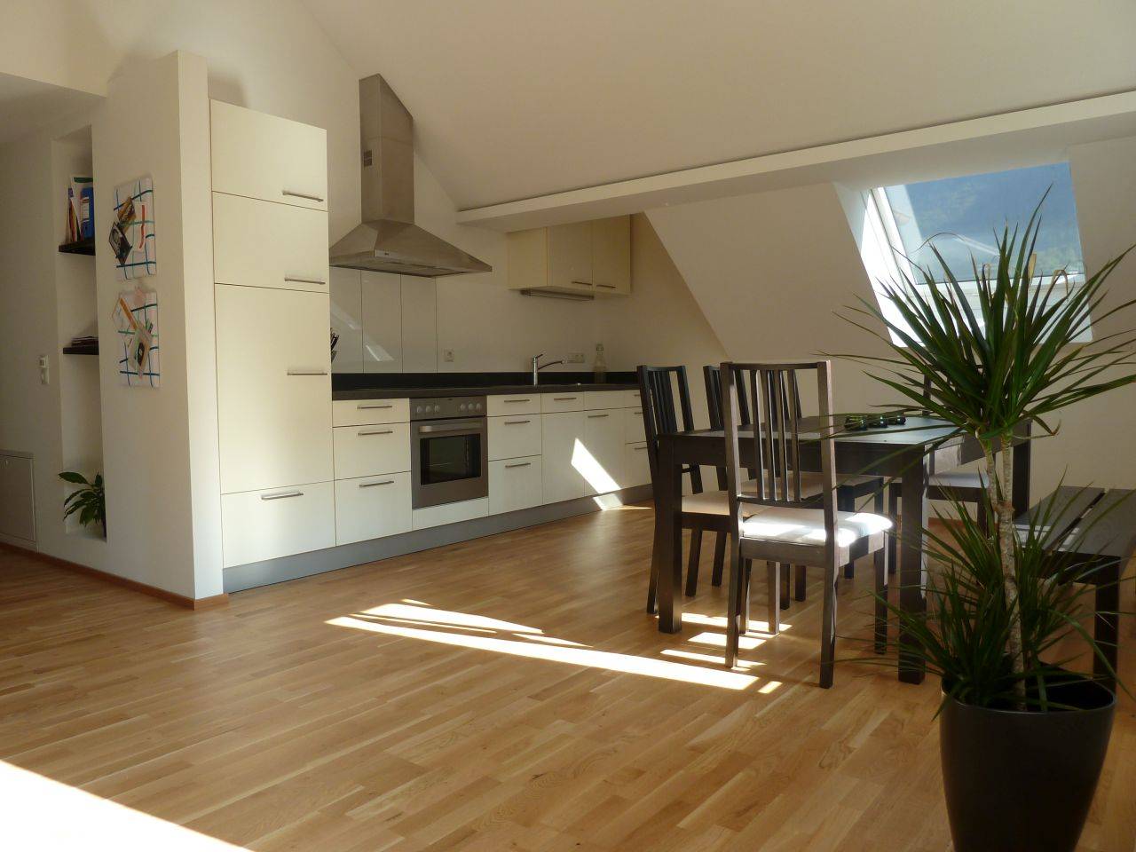 Bright dachgeschosswohnung with terrace and garden