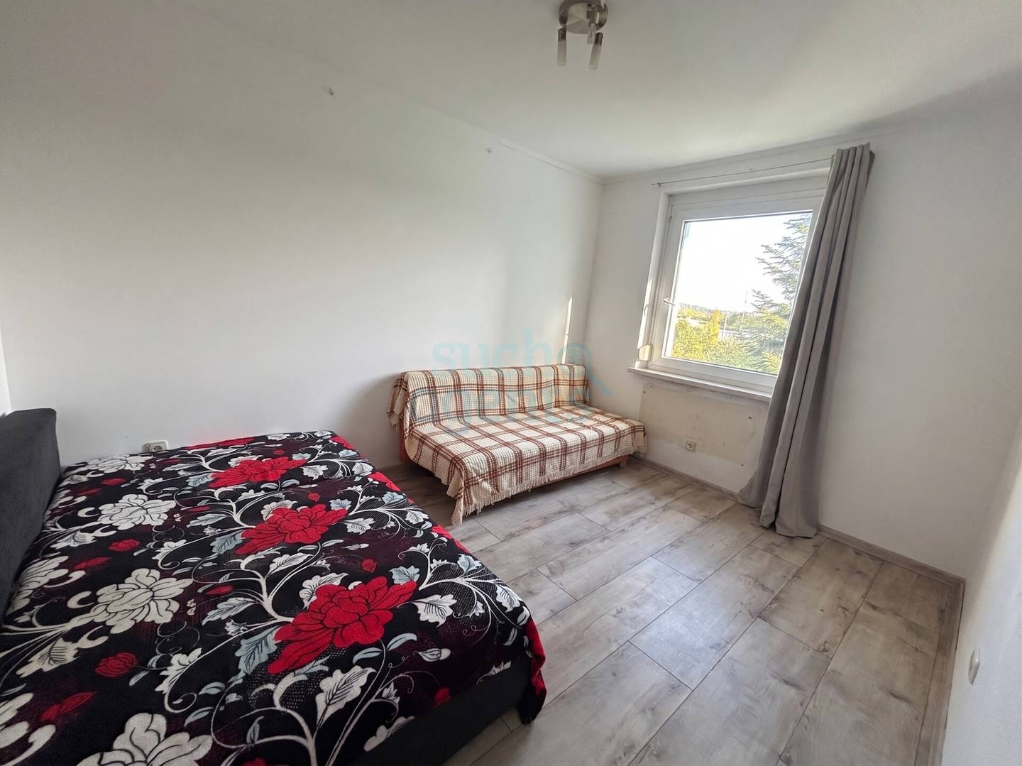 Wohnung mit südlichem Wintergarten und zwei Stellplätzen