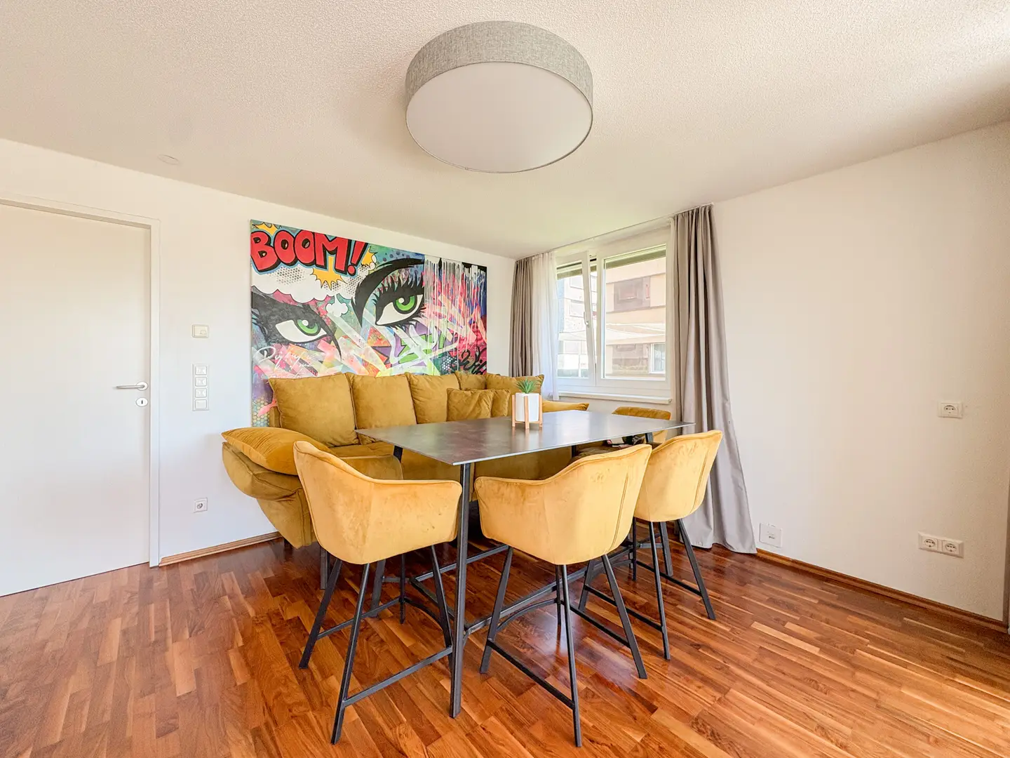 Light filled ground floor apartment with private garden and underground parking included
