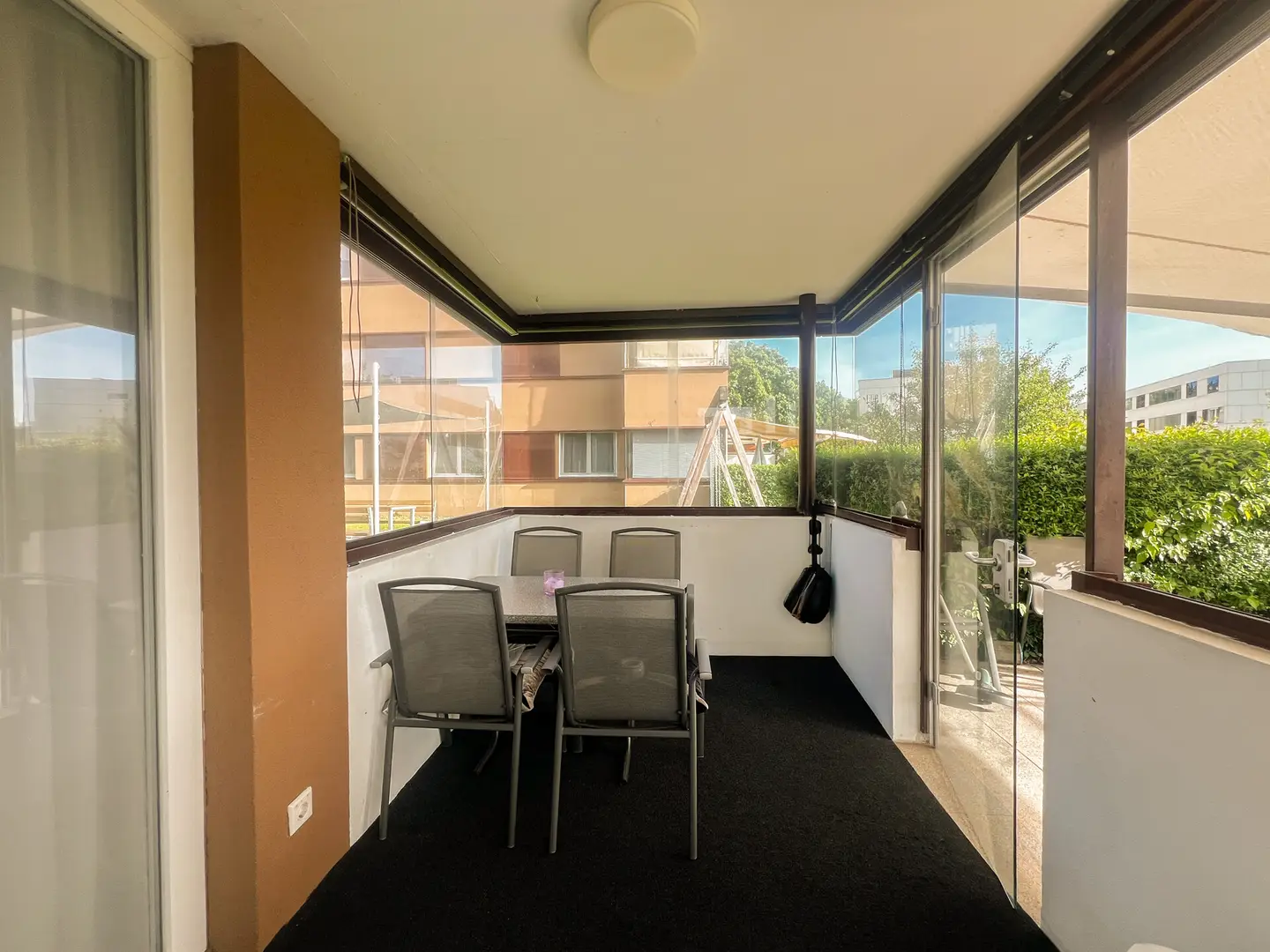 Light filled ground floor apartment with private garden and underground parking included