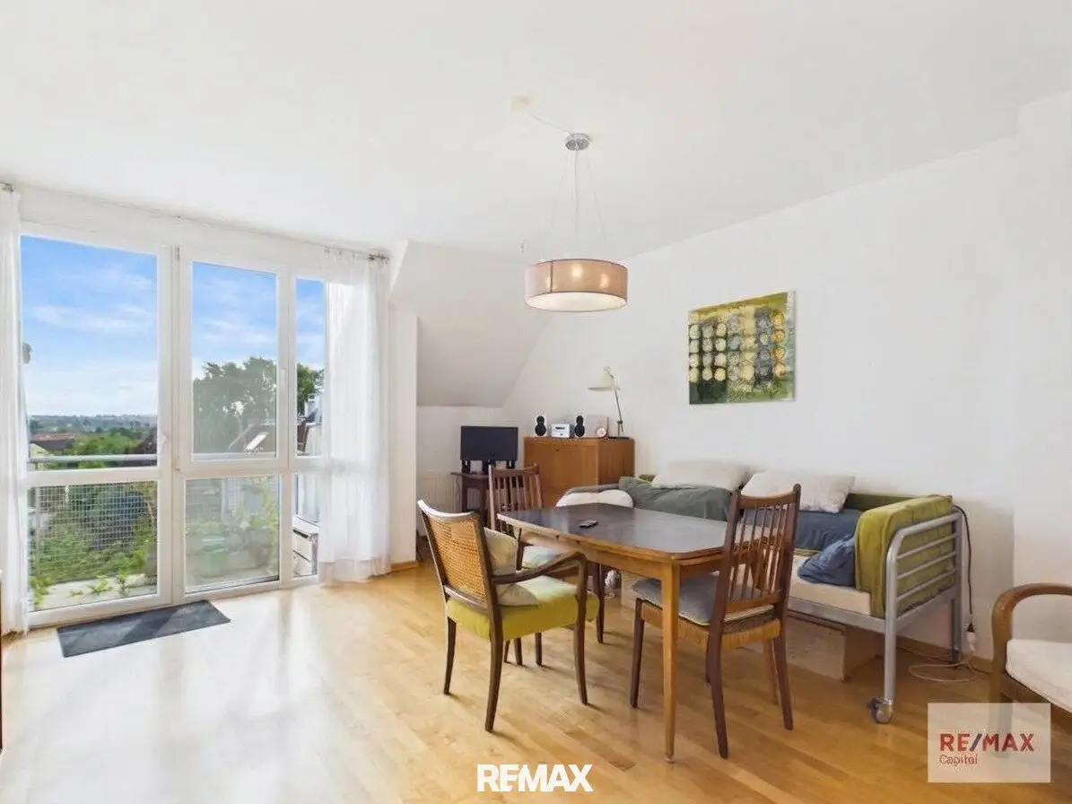 Fernblick: 3-Zimmer-Dachgeschosswhg. in Wolkersdorf mit Loggia und Tiefgaragenplatz