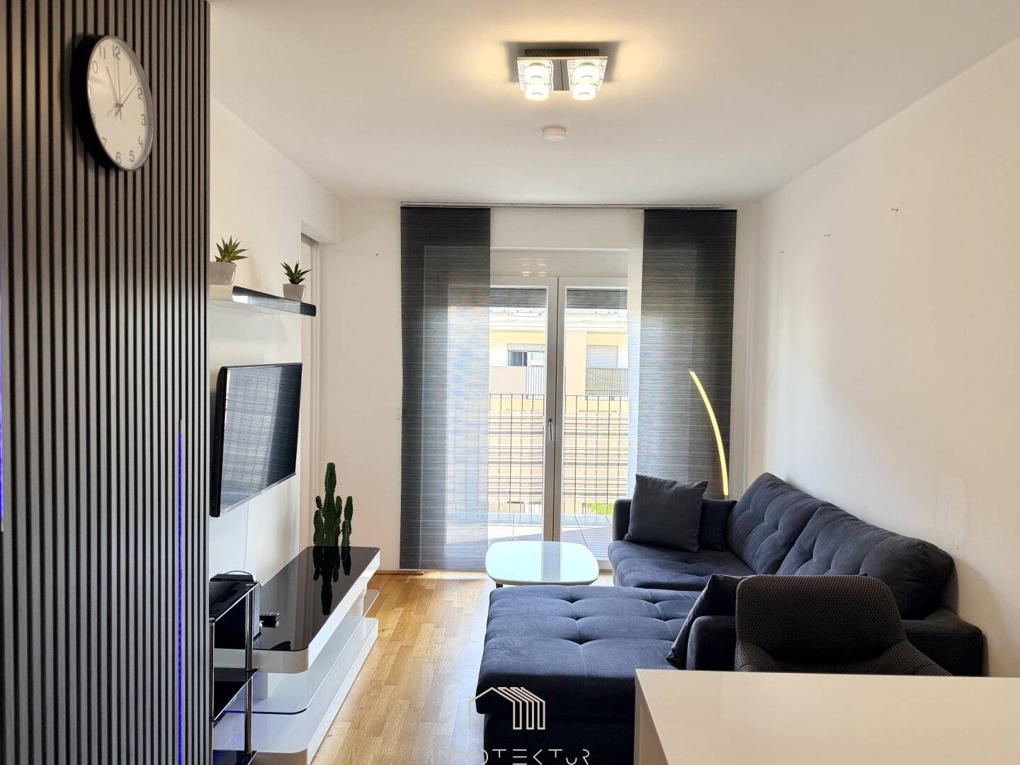 PUNTIGAM: Bright 2-room apartment with covered balcony and optional underground garage