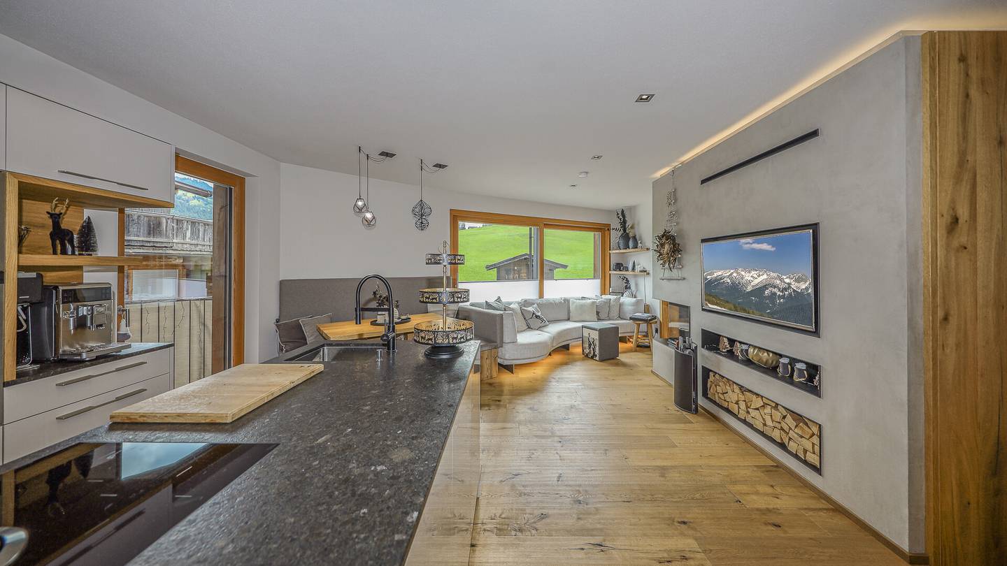Erdgeschosswohnung ski in ski out with glass fireplace