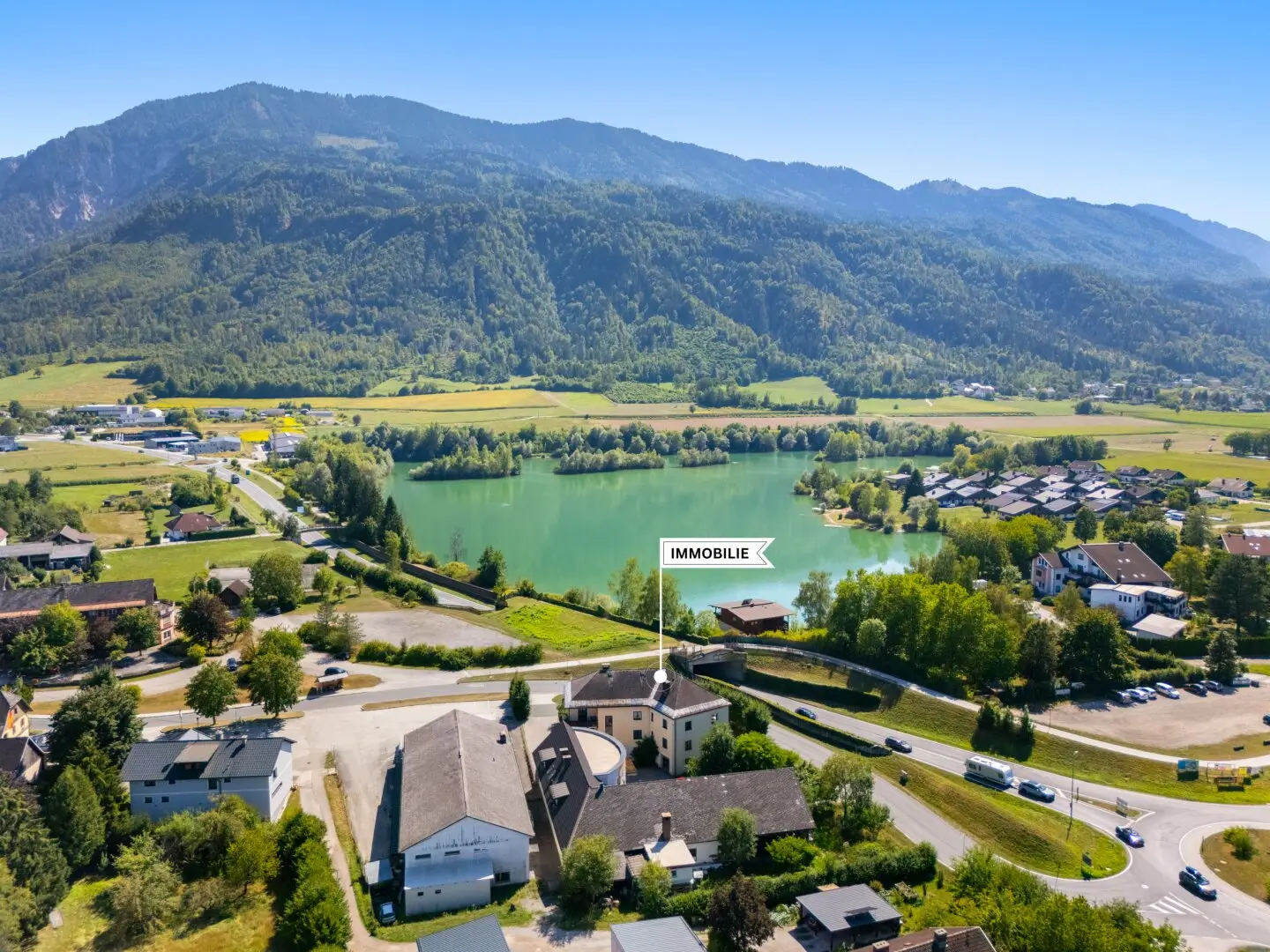 Multi-family residential building with 400m² with 2 apartments plus 10 single rooms near Ratzteich in Kirschentheuer - Ferlach