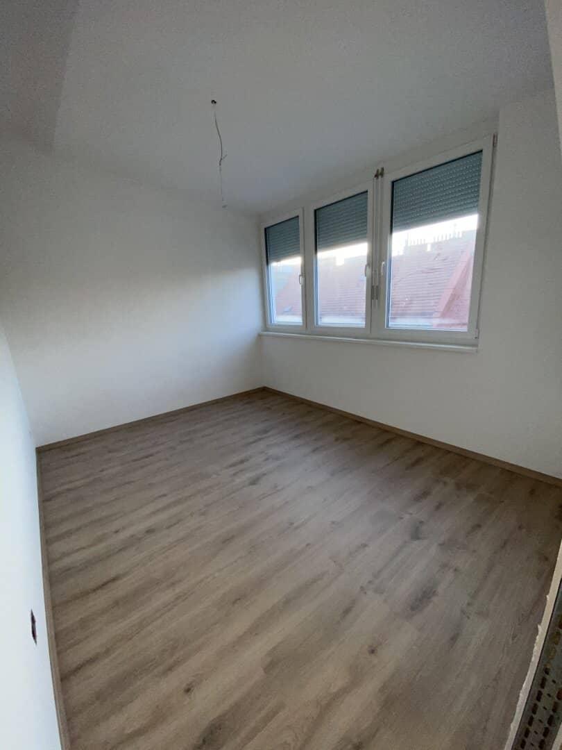 Like-new 2-room apartment with underfloor heating and fitted kitchen in 1150 Wien, 1st attic floor, 50.9 m²