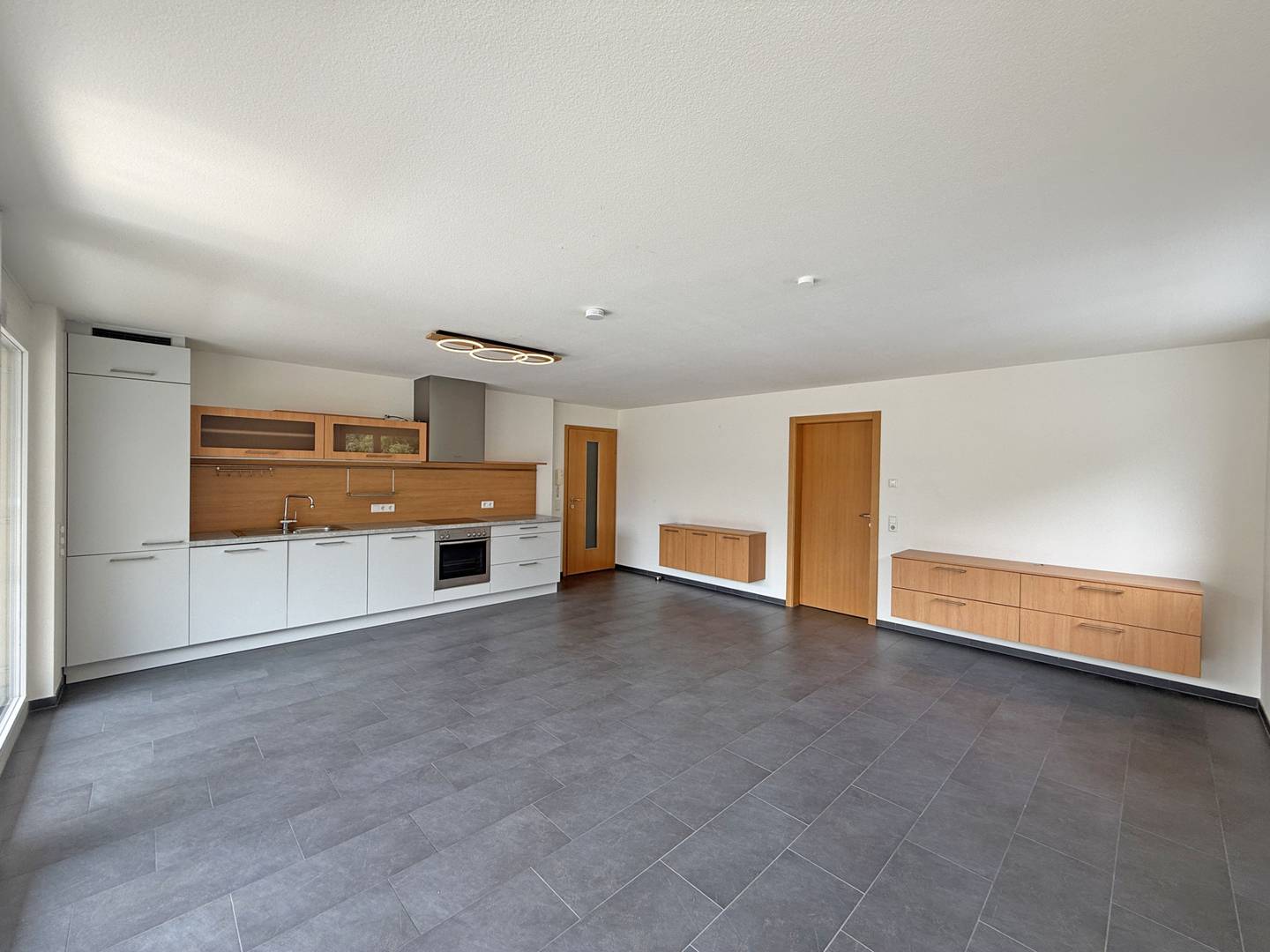 Südlich ausgerichtete Wohnung mit Terrasse und Carport