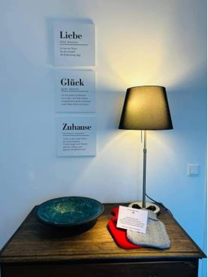 Lichtdurchflutete Dachgeschosswohnung mit Dachterrasse und Grünblick