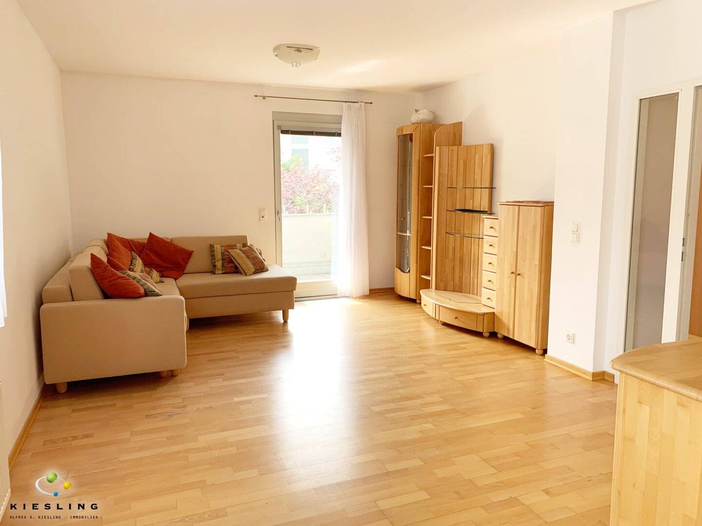Living in 1230 Vienna: 2-room apartment with loggia, green view and garage parking space