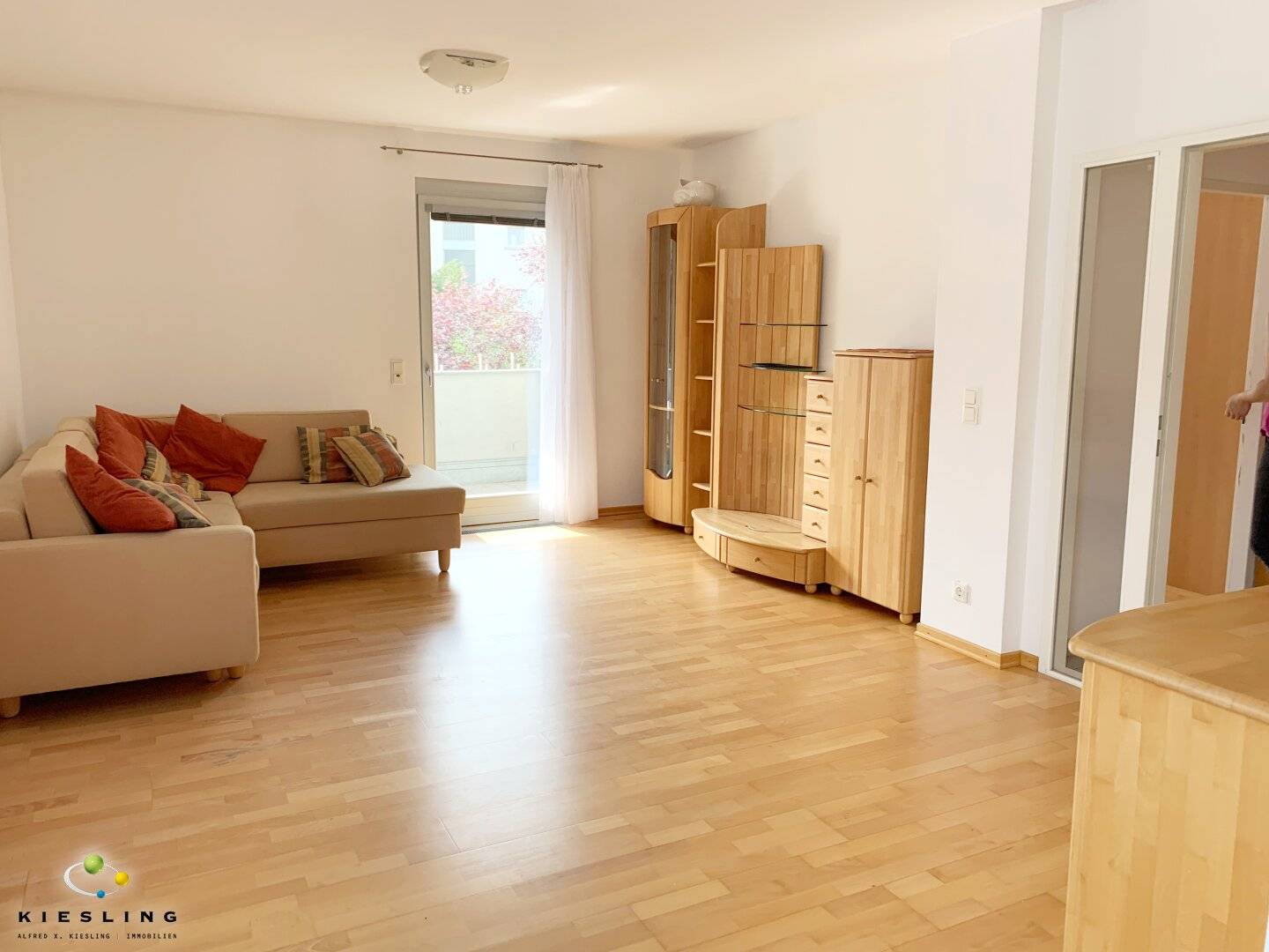 Living in 1230 Vienna: 2-room apartment with loggia, green view and garage parking space