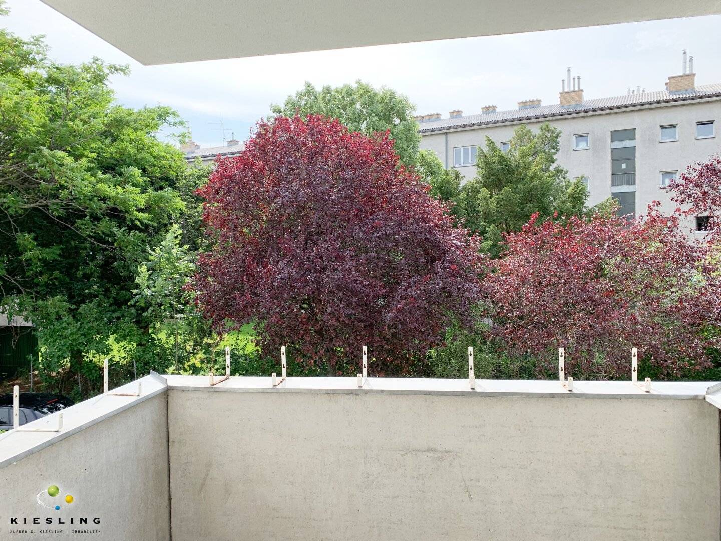 Living in 1230 Vienna: 2-room apartment with loggia, green view and garage parking space