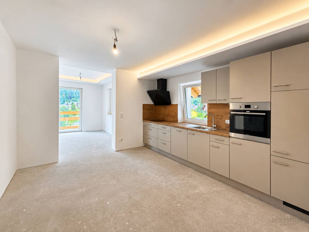Erstbezug Dachgeschosswohnung mit großzügiger Terrasse und Bergblick