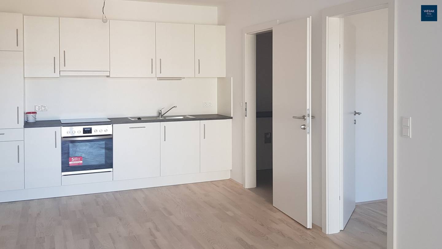 1 MONTH RENT-FREE - Light-flooded living: 2-room apartment with large balcony for outdoor quality of life - Top 136
