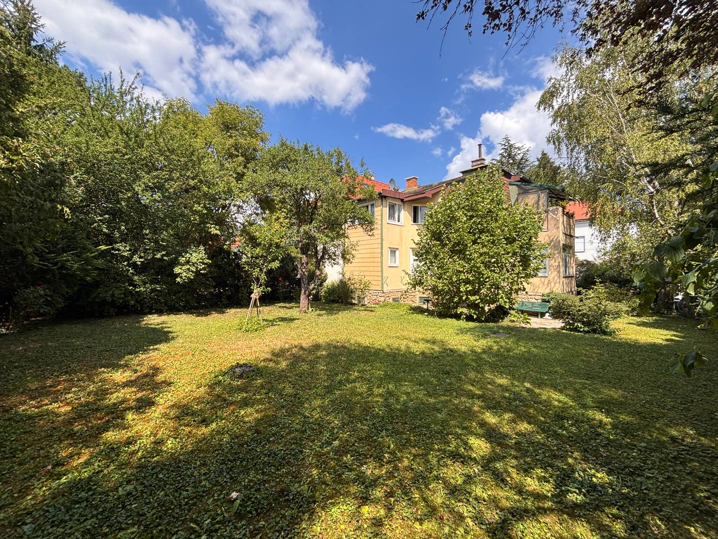 Investment apartment with private garden and carport