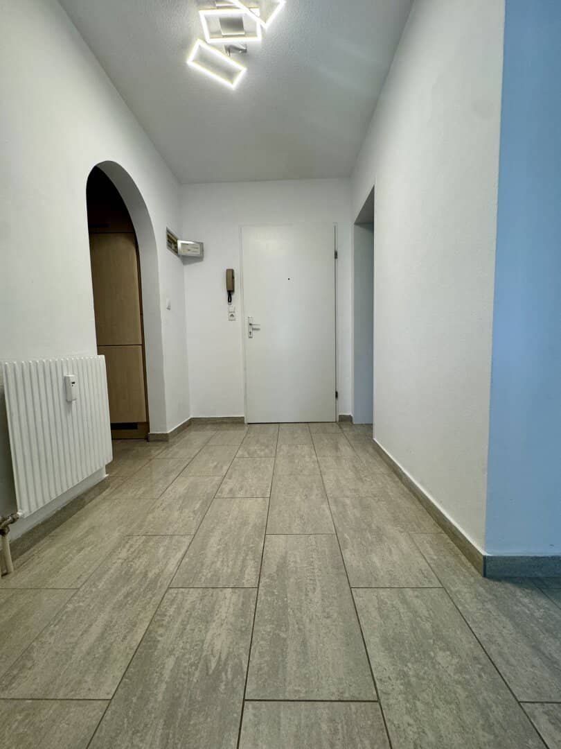 Pretty 2-room apartment with garden and terrace and garage in a nice location
