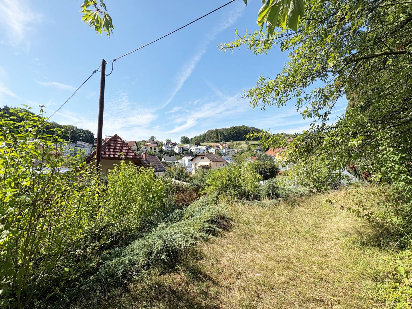 Familienwohnung mit Doppelgarage und Fernblick in grüner Lage