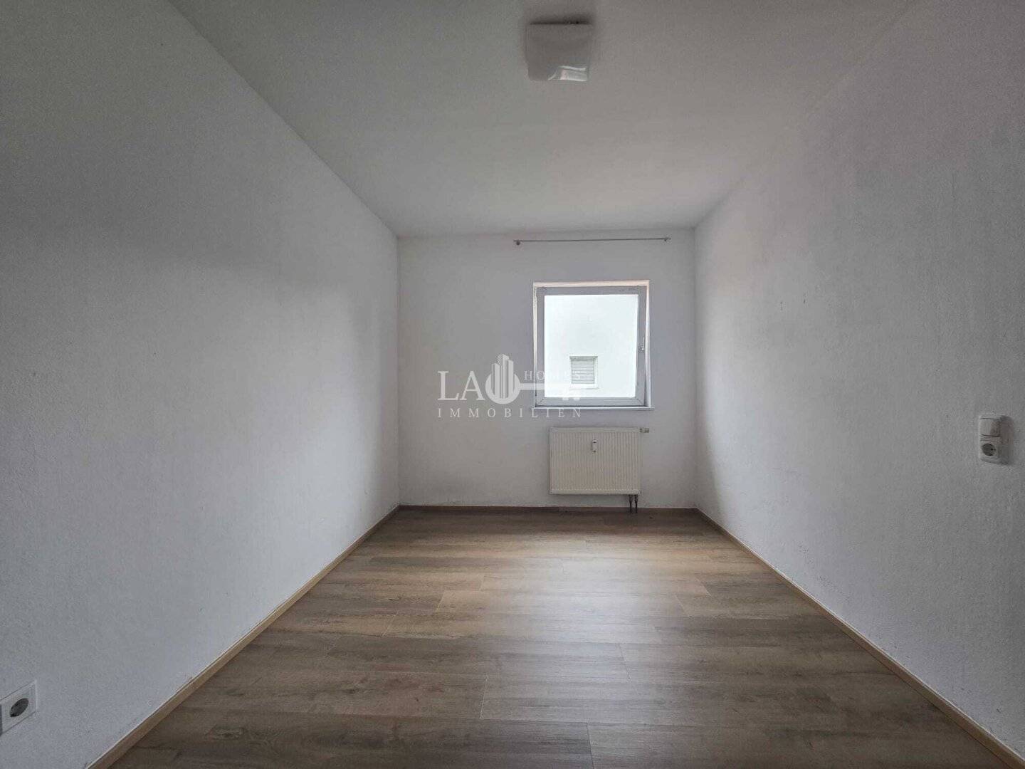Charming 4-room apartment with balcony and parking