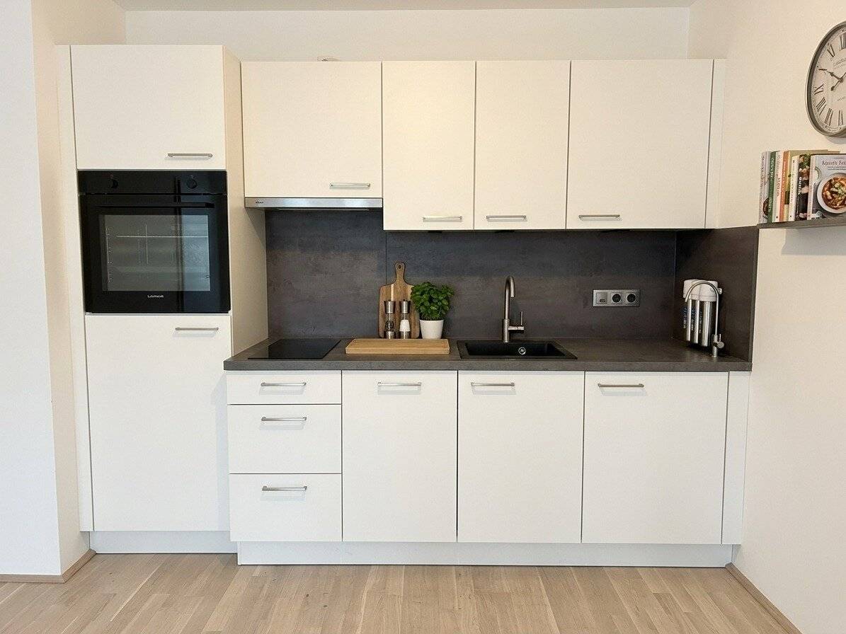 First-occupancy 2-room apartment with balcony and underfloor heating in 1100 Vienna