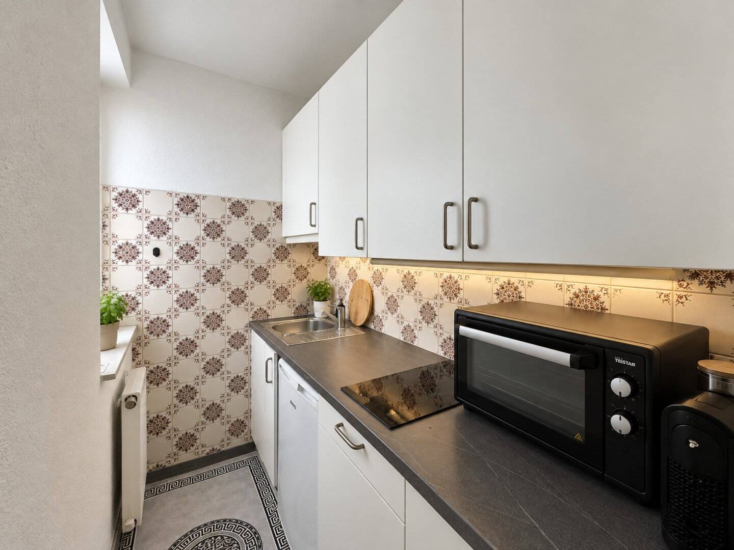 Zentrale 1-Zimmer-Wohnung mit Stellplatz in Bahnhofsnähe