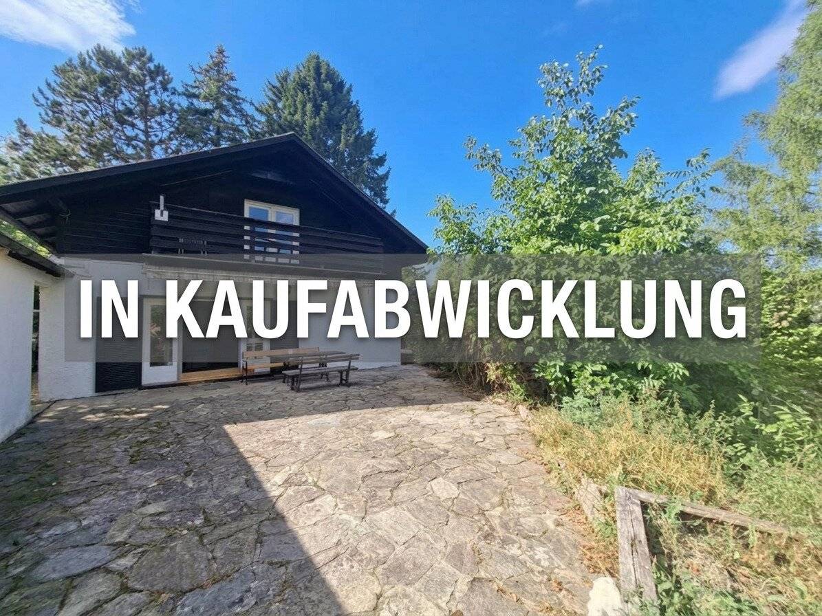 Charming wooden house with view, nature and lots of development potential in the Vienna Woods