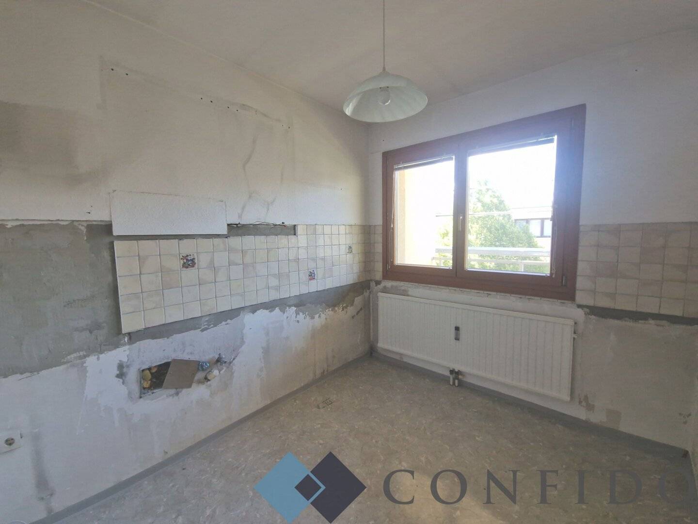 Charming 3-room apartment with loggia and west balcony in 1230 Vienna – in need of renovation!