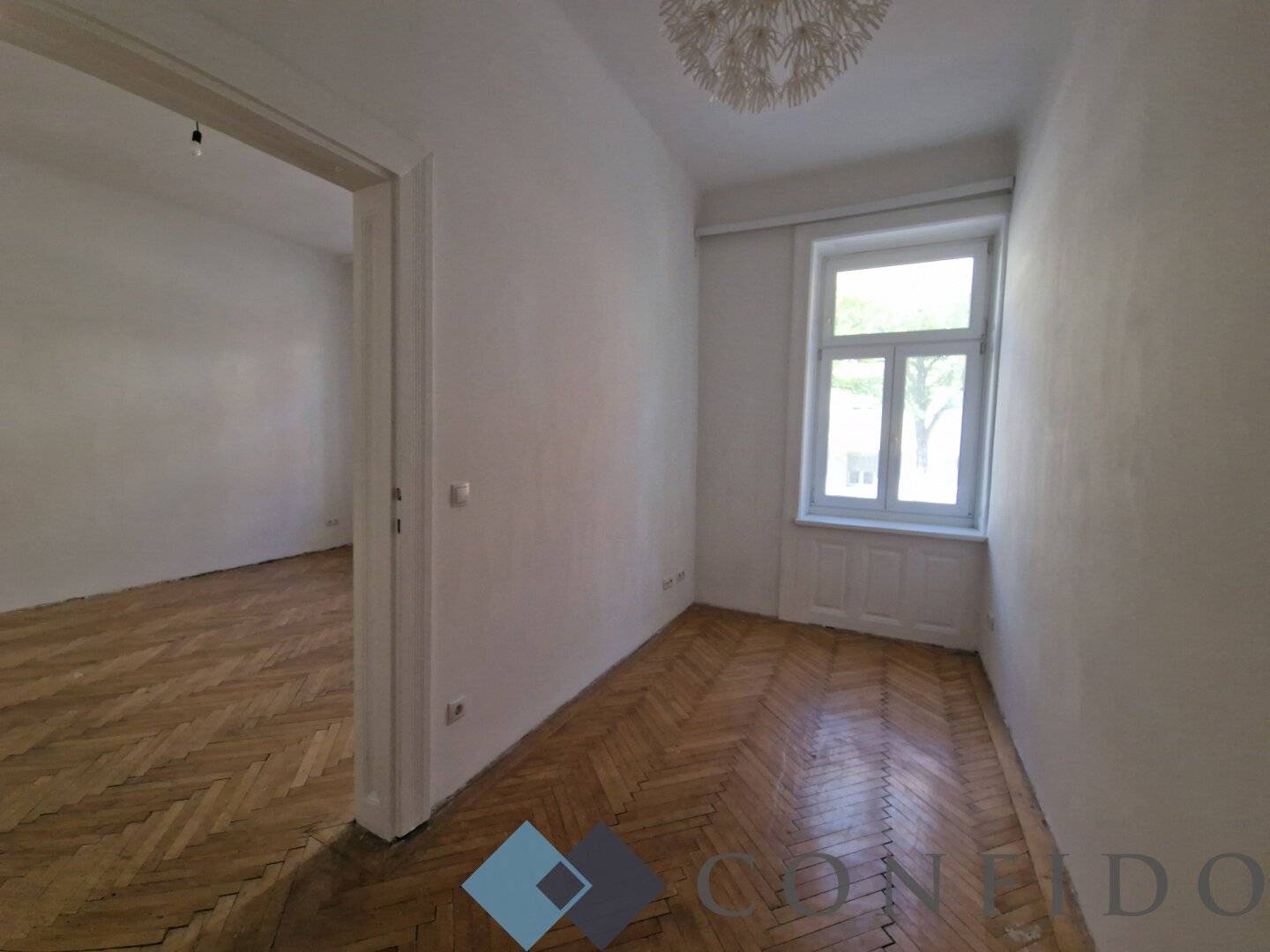 Condominium at Stöberplatz - Renovation-needing 2-room apartment on the raised ground floor