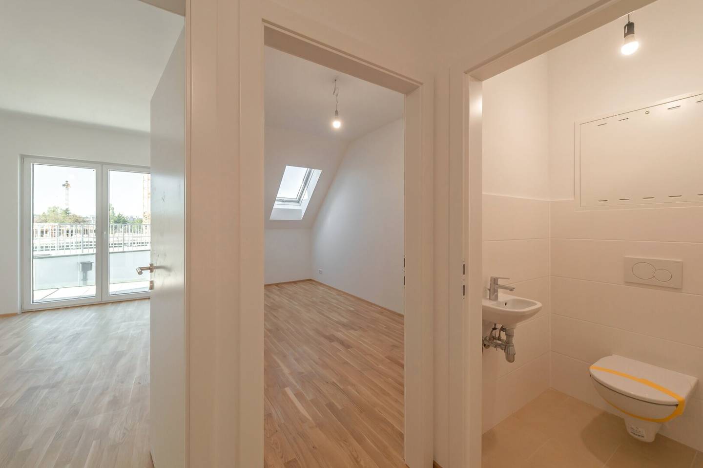 NEW 3-room attic new build with terrace near Kagraner Platz!