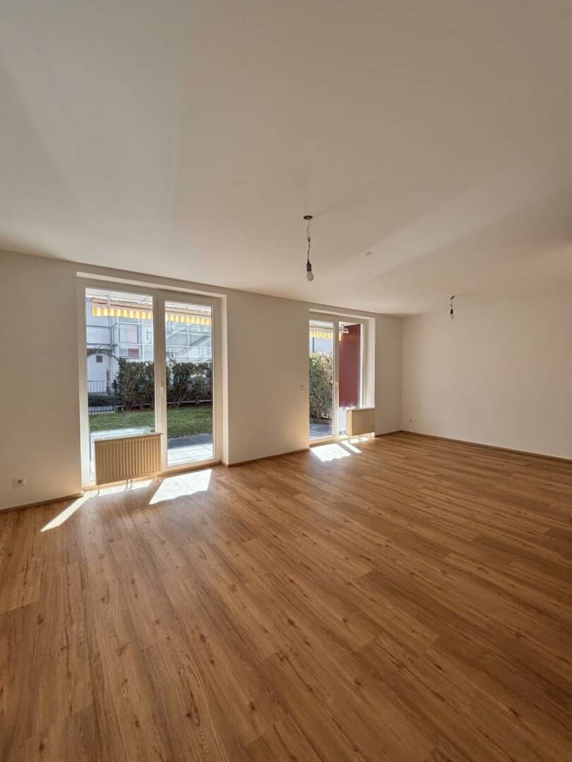 100 m² Wohngefühl auf zwei Ebenen | 4-Zimmer-Gartenmaisonette mit Südterrasse und Balkon | Inklusive Tiefgaragenstellplatz!