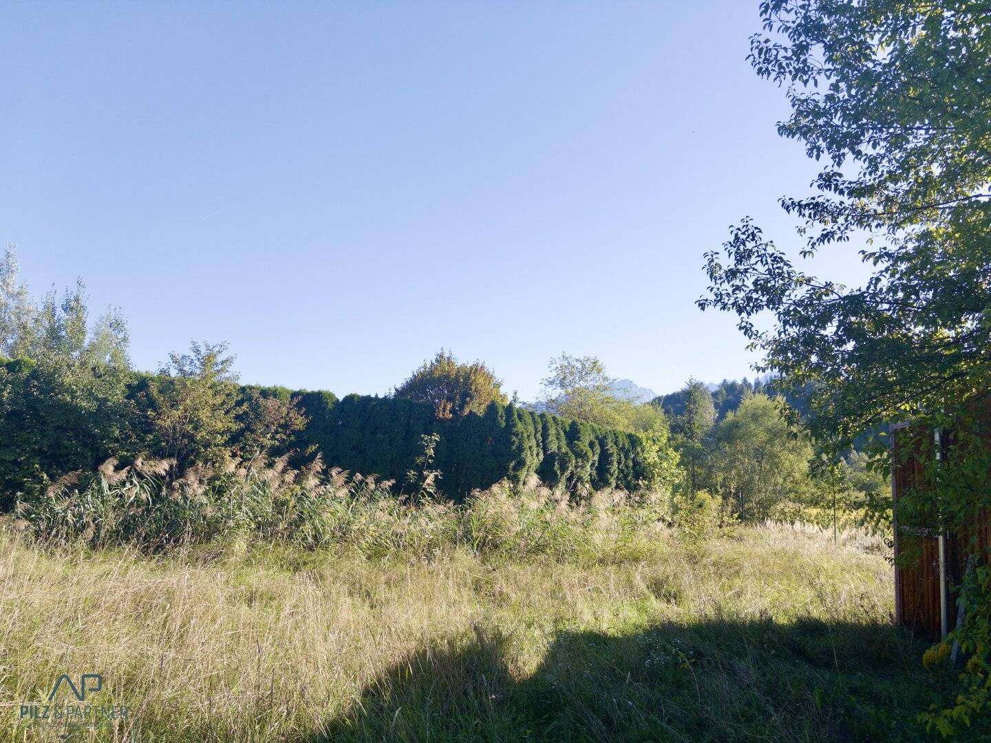 Leisure idyll with stream and motorhome parking space.
