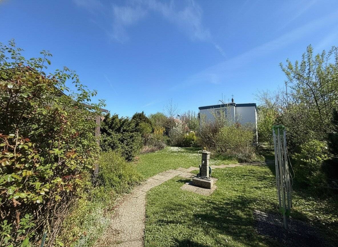 RENOVATE OR BUILD NEW! Allotment garden house on double plot near subway