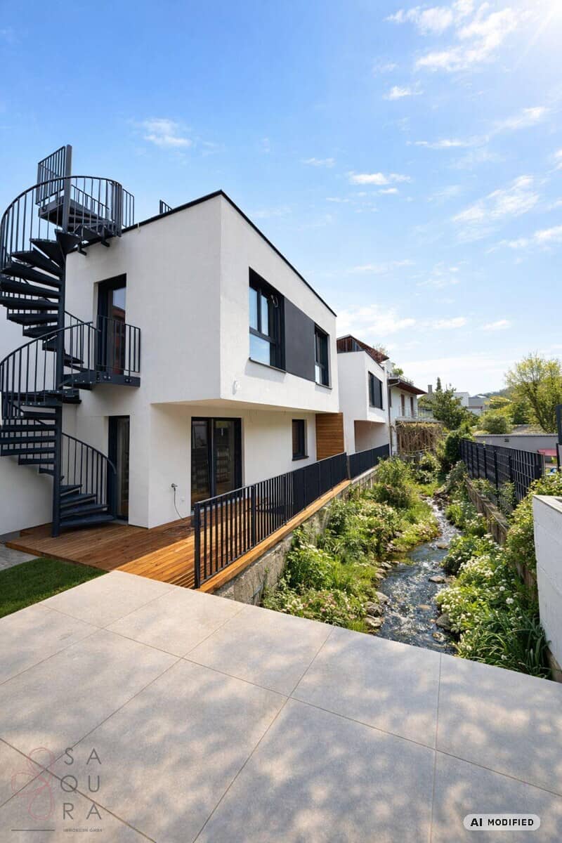 Familienwohnung mit Bachkulisse und Dachterrasse