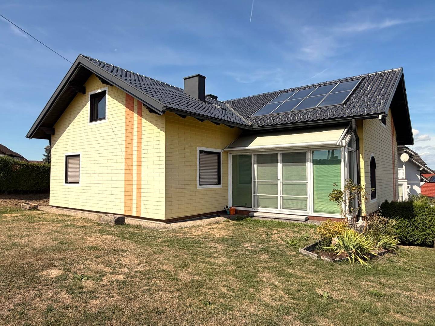 Gepflegte Familienwohnung mit Garten und Wintergarten