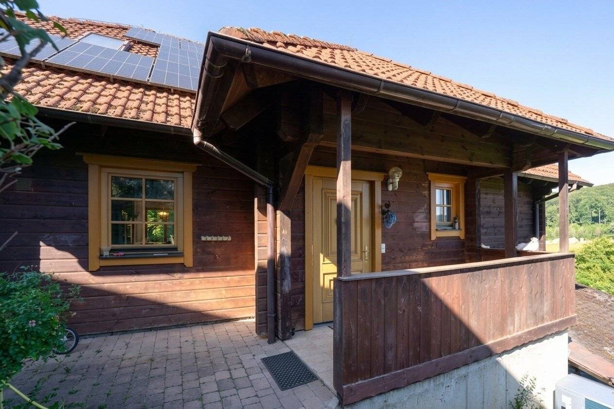 A Home to Feel Good In: Spacious Wooden Log House with Garden and Modern Building Services