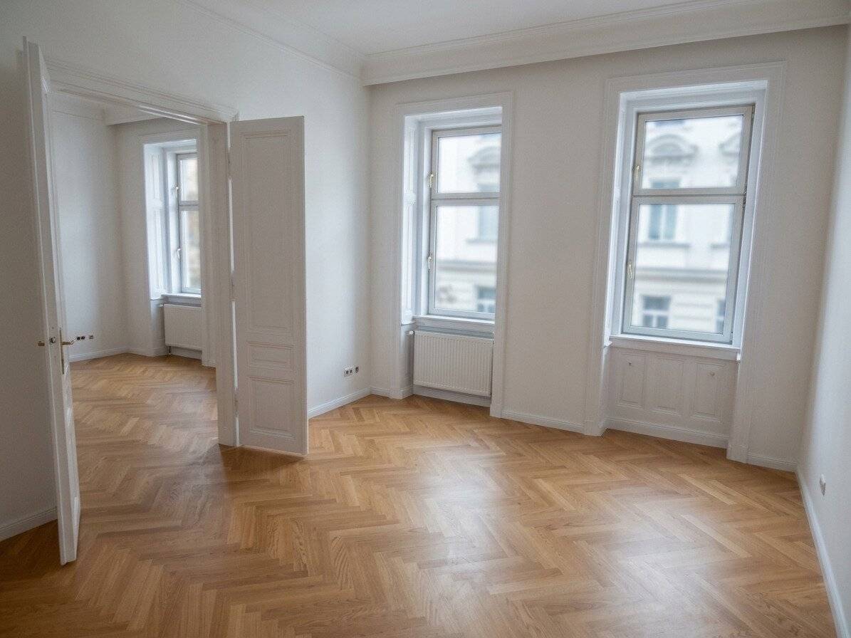Sanierte Altbauwohnung mit Flügeltüren und neuen Parkettboden