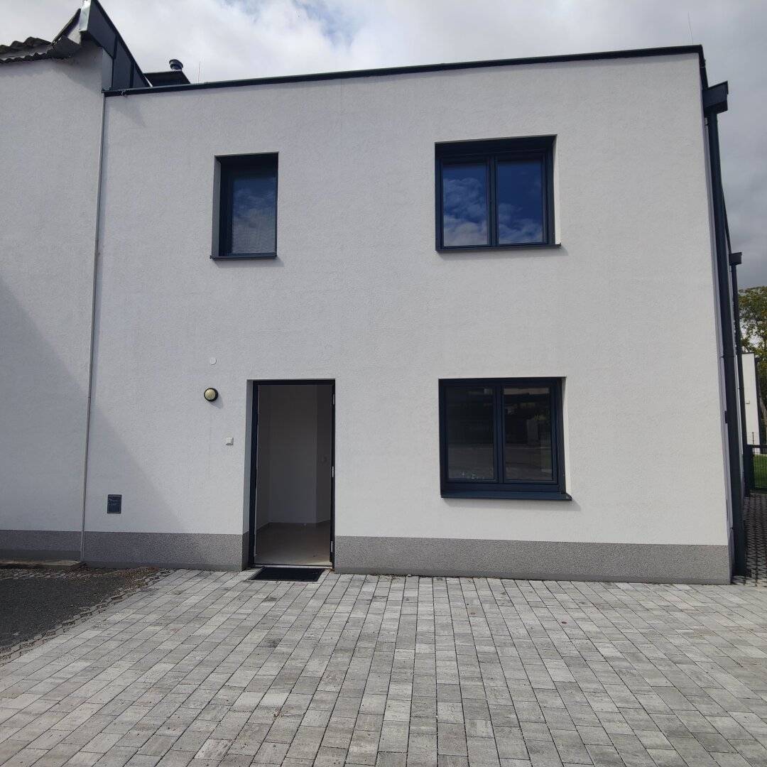 New single-family house with garden in central location of Bisamberg