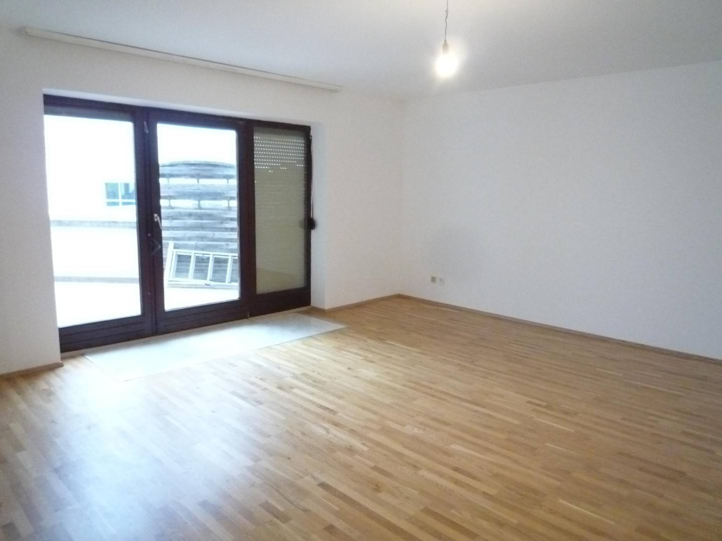 Helle Wohnung mit großer Südwestterrasse und Garage