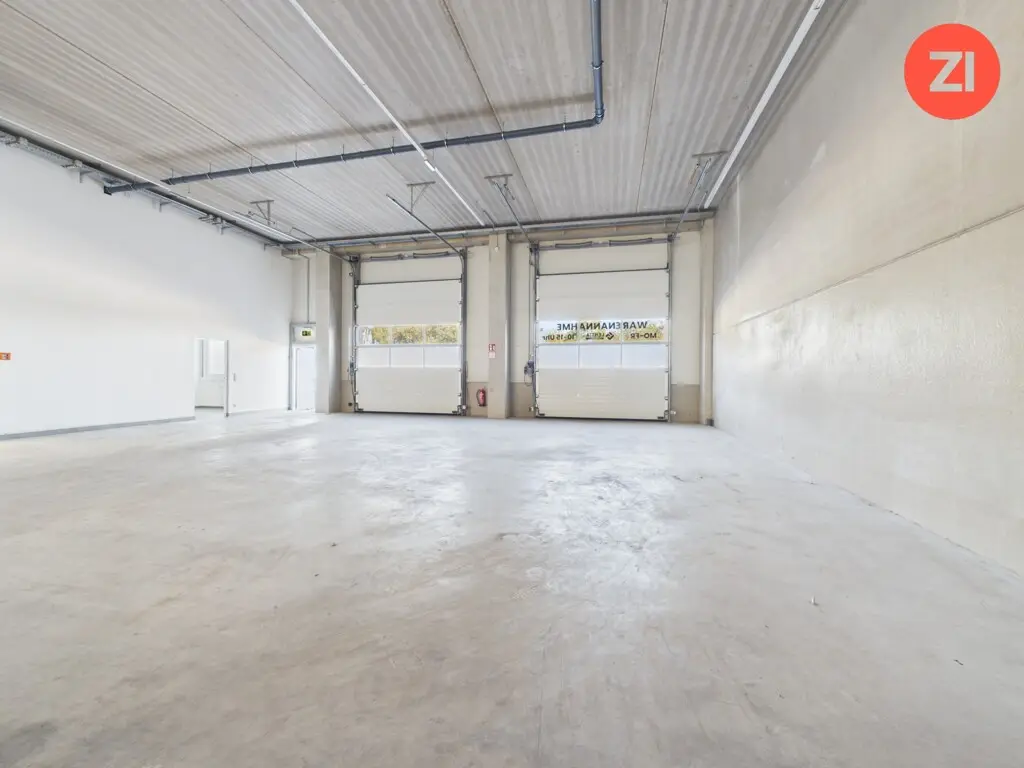 Neuwertige Halle mit Bürotrakt und Erdwärme Loftwohnung