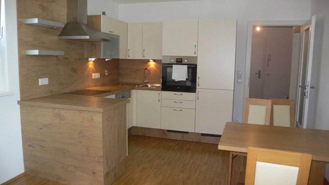 Trendy 2-room apartment Mondsee/Schlössl with sunny west balcony, lift, underground parking space and car parking space