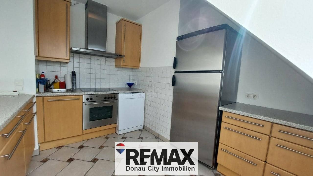 Bright top floor apartment with distant view Dachgeschosswohnung